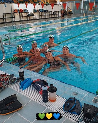 Competitive swimming action