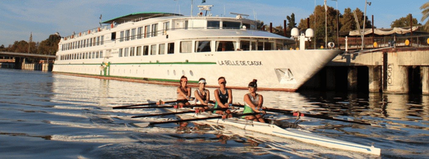 Elite rowing crew training on the Guadalquivir in Seville