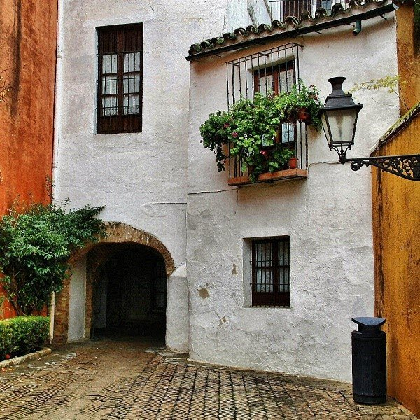 Traditional Andalusian house with flower boxes