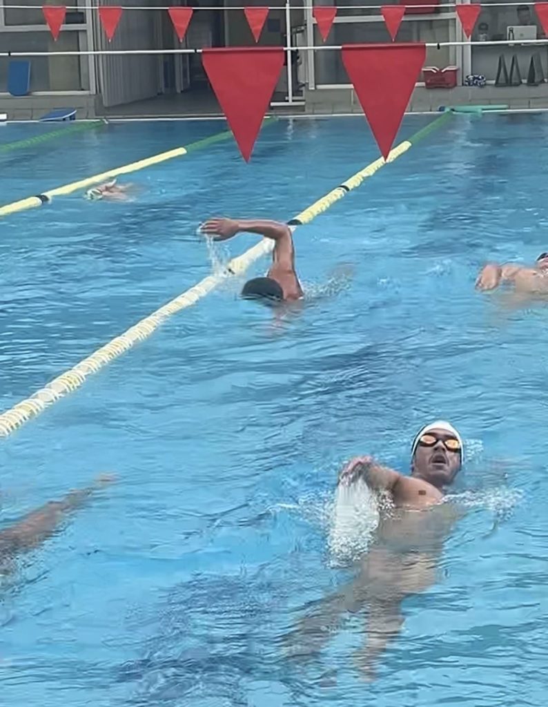 Student athletes training in the swimming pool