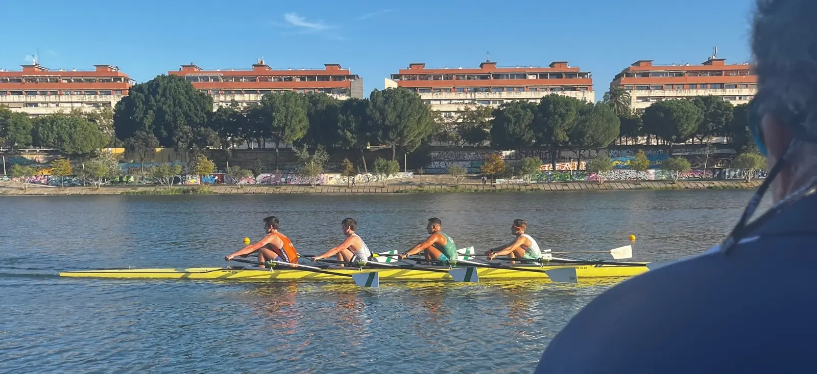 SAIIE student training in a quad on the Guadalquivir River in Seville
